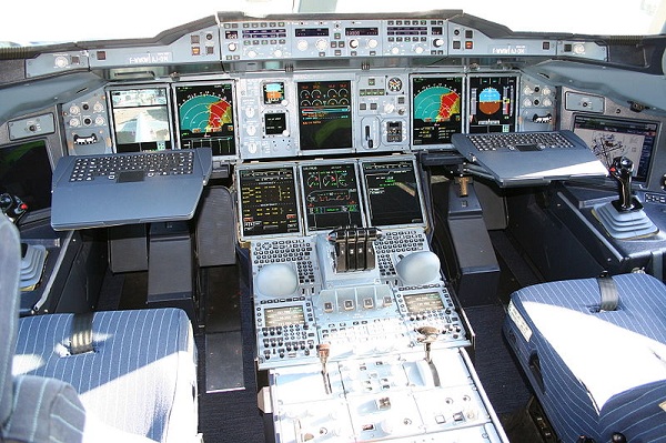  Airbus A380 cockpit. Most Airbus cockpits are computerised glass cockpits featuring fly-by-wire technology. The control column has been replaced with an electronic sidestick. 